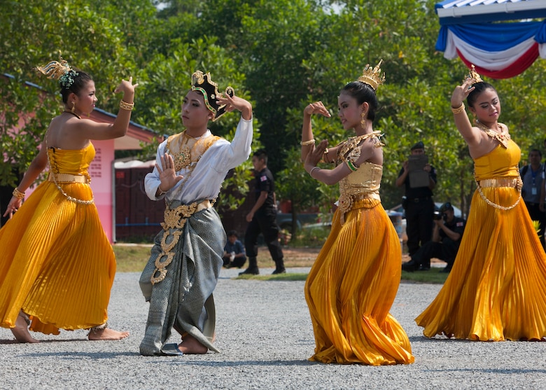 School children perform a traditional Thai dance during the dedication ceremony for a one-room multi-purpose educational building Feb. 18 at Ban Sa Yai, Trat, Thailand. The construction at Ban Sa Yai was one of six humanitarian civic action sites in which the Thai, U.S. and partner nation’s militaries will worked together on civic programs during Cobra Gold 2016. The HCA programs will help improve the quality of life, as well as the general health and welfare of civilian residents in the exercise areas.   (U.S. Marine Corps photo by SSgt. Jose O. Nava/Released)