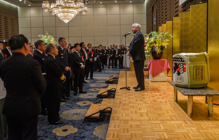 Gen Nakatani, Minister of Defense for Japan, gives opening remarks at the Japan Joint Staff 10th anniversary ceremony at Hotel Grand Hill, Ichigaya, Japan, Feb. 17, 2016. The JJS council was created July 1, 1954, and consists of four sections: joint staff councilor, public affairs, legal affairs and logistics. (U.S. Air Force photo by Senior Airman David Owsianka/Released)
