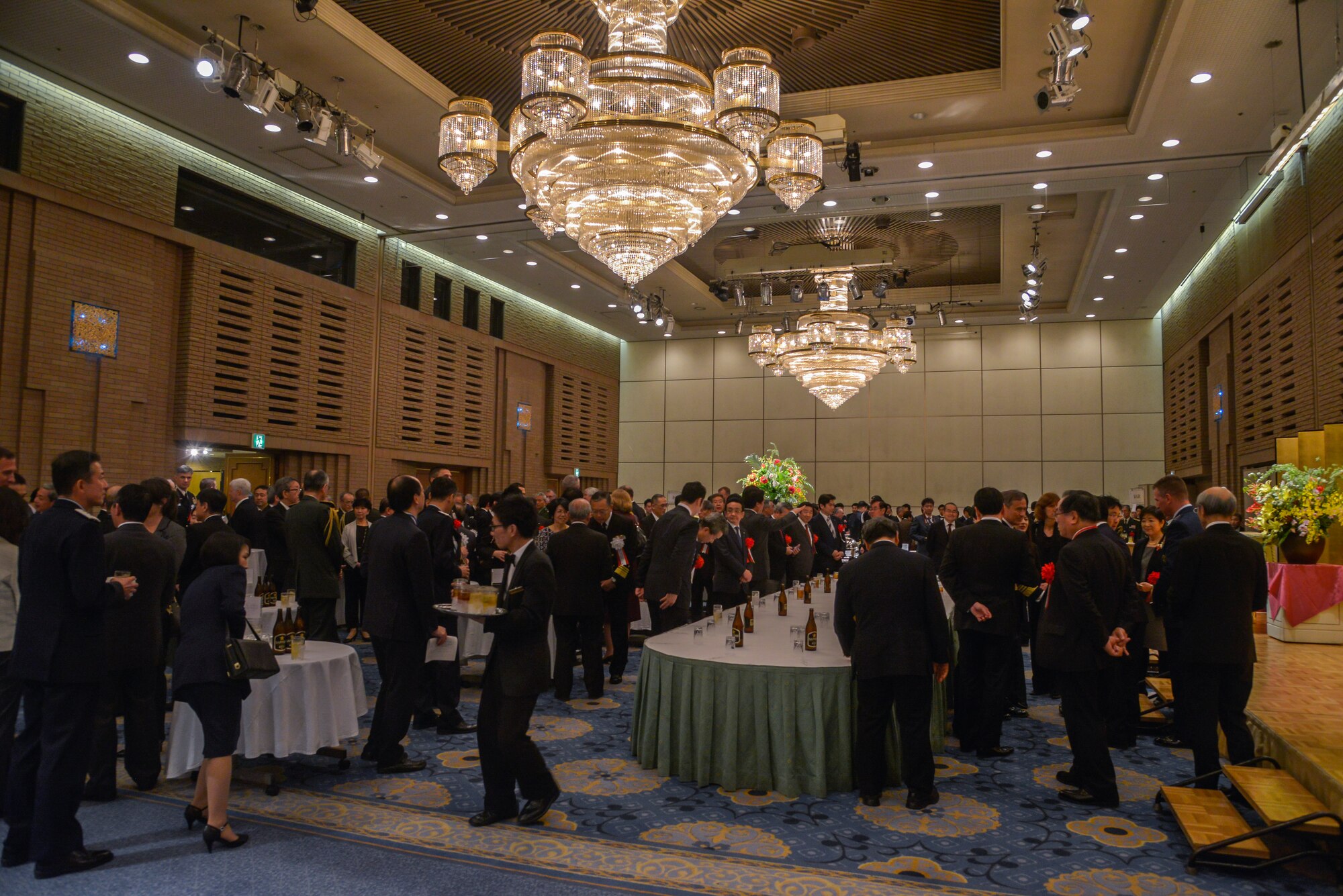 Members from the U.S. military, Japan Joint Staff and military service members from multiple foreign countries intermingle during the JJS 10th anniversary ceremony at Hotel Grand Hill, Ichigaya, Japan, Feb. 17, 2016. The JJS council was created July 1, 1954, and consists of four sections: joint staff councilor, public affairs, legal affairs and logistics. (U.S. Air Force photo by Senior Airman David Owsianka/Released)