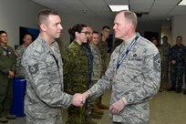 The Chief Master Sgt. of the Air Force James Cody  visited Peterson Air Force Base, Colorado, February 10-12, to meet with Airmen from nearby bases and tour North American Aerospace Defense Command and U.S. Northern Command. Cody also gave thanks to the Canadian and interagency counterparts working shoulder-to-shoulder with U.S. servicemembers, stopping to present recognition coins to four U.S. and one Canadian enlisted member for excellence.

