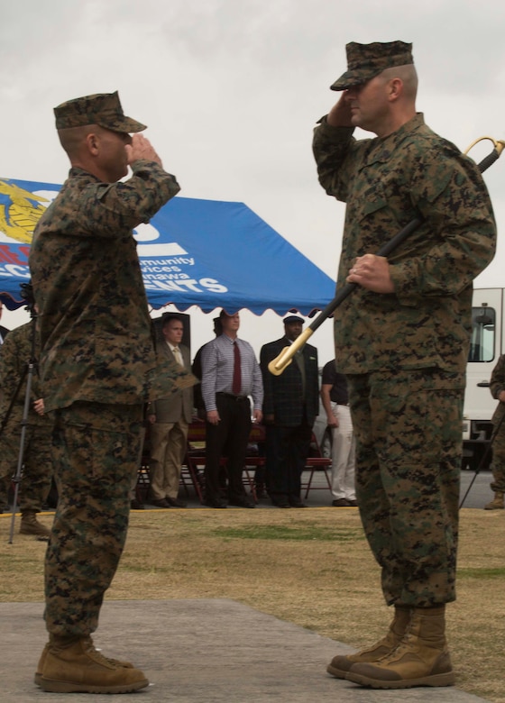 Sgt. Maj. R. Kevin Williamson, right, salutes Brig. Gen. Joaquin F. Malavet during a relief and appointment ceremony Feb. 19 on Camp Foster, Okinawa, Japan. Williamson was appointed sergeant major of Marine Corps Installations Pacific-Marine Corps Base Camp Butler, Japan in October 2013. Williamson was relieved by Sgt. Maj. Peter A. Siaw, and will move on to his new assignment at Manpower Management Division, Manpower Reserve Affairs, Headquarters Marine Corps. Malavet is the commanding general of MCIPAC. (U.S. Marine Corps Photo by Cpl. Brittany A. James/ Released)