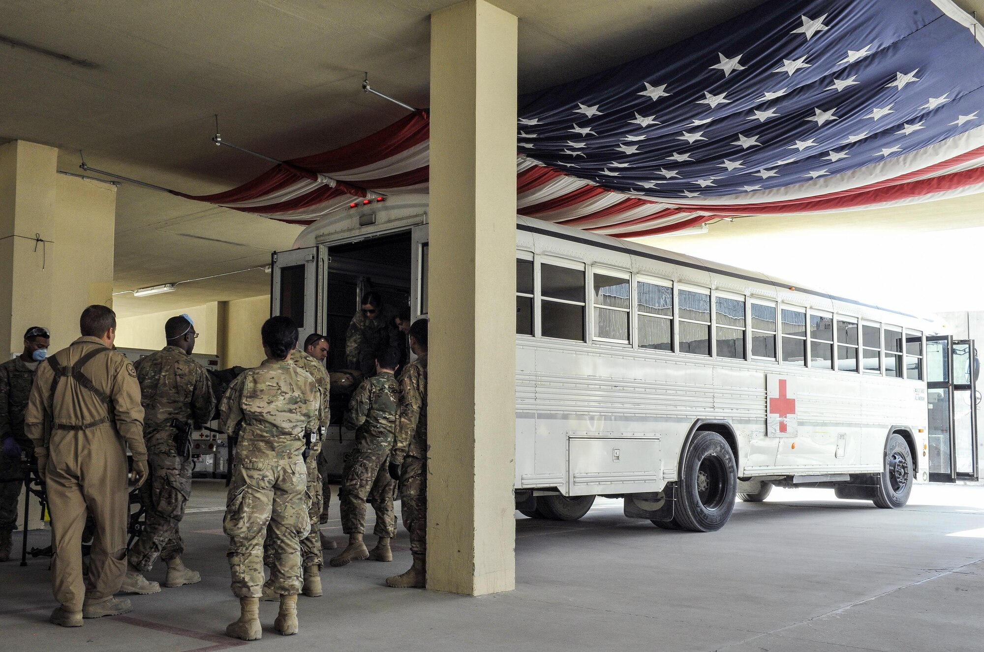 A 455th Expeditionary Medical Group team loads the Extracorporeal Membrane Oxygenation team’s equipment during a patient transfer at the Craig Joint-Theater Hospital at Bagram Air Field, Afghanistan, on Feb. 18, 2016. The ECMO team, dispatched from San Antonio Military Medical Center, uses technology that bypasses the lungs and infuses the blood directly with oxygen, while removing the harmful carbon dioxide from the blood stream. The patient was airlifted to Landstuhl Regional Medical Center, Germany, where he will receive 7 to 14 days of additional ECMO treatment. (U.S. Air Force photo by Tech. Sgt. Nicholas Rau)