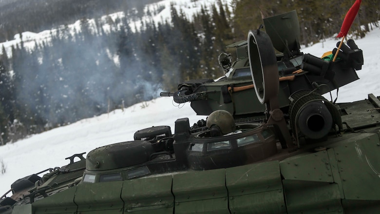 The Mk 19 of an amphibious assault vehicle fires across the valley of a range in Rena, Norway during a live-fire exercise Feb. 17, 2016. The Marines and the Norwegian Army are preparing themselves for Exercise Cold Response 16, which will bring together 12 NATO allies and partner nations and approximately 16,000 troops in order to enhance joint crisis response capabilities in cold weather environments. 