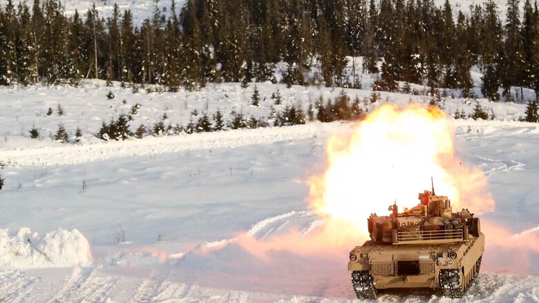 A M1A1 Abrams Tank fires its main gun as it takes part in a live-fire exercise in Rena, Norway, Feb. 18, 2016. The Marines are preparing themselves for Exercise Cold Response 16, which will bring together 12 NATO allies and partner nations and approximately 16,000 troops in order to enhance joint crisis response capabilities in cold weather environments.