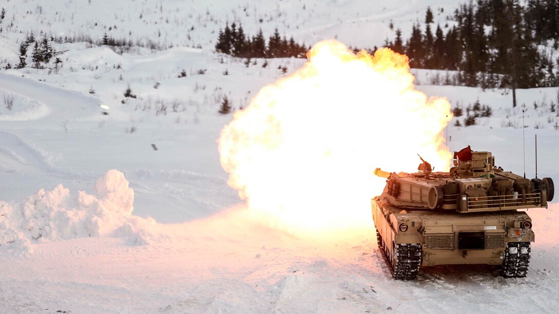 A M1A1 Abrams tank fires its main gun as it takes part in a live-fire exercise in Rena, Norway, Feb. 18, 2016. The Marines are preparing themselves for Exercise Cold Response 16, which will bring together 12 NATO allies and partner nations and approximately 16,000 troops in order to enhance joint crisis response capabilities in cold weather environments. 