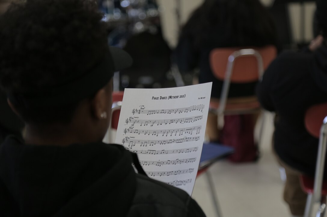 On Feb. 17, 2016, a jazz combo from "The President's Own" U.S. Marine Band presented a Music in the High Schools program at Fairmont Heights High School in Capitol Heights, Md. The performance included music from the combo's "musical heroes." At the conclusion of the program one of the students raised his hand and said, "I've only been playing the bass for three months. I didn't know you could make it sing like that." He pointed to the combo's bass player and said, "He is my musical hero!" (U.S. Marine Corps photo by Master Sgt. Kristin duBois/released)