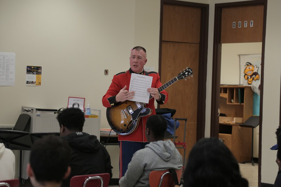 On Feb. 17, 2016, a jazz combo from "The President's Own" U.S. Marine Band presented a Music in the High Schools program at Fairmont Heights High School in Capitol Heights, Md. The performance included music from the combo's "musical heroes." At the conclusion of the program one of the students raised his hand and said, "I've only been playing the bass for three months. I didn't know you could make it sing like that." He pointed to the combo's bass player and said, "He is my musical hero!" (U.S. Marine Corps photo by Master Sgt. Kristin duBois/released)