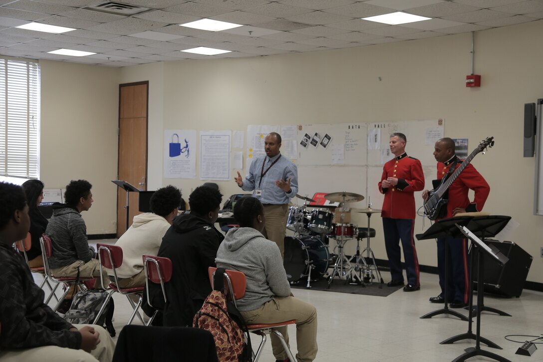 On Feb. 17, 2016, a jazz combo from "The President's Own" U.S. Marine Band presented a Music in the High Schools program at Fairmont Heights High School in Capitol Heights, Md. The performance included music from the combo's "musical heroes." At the conclusion of the program one of the students raised his hand and said, "I've only been playing the bass for three months. I didn't know you could make it sing like that." He pointed to the combo's bass player and said, "He is my musical hero!" (U.S. Marine Corps photo by Master Sgt. Kristin duBois/released)