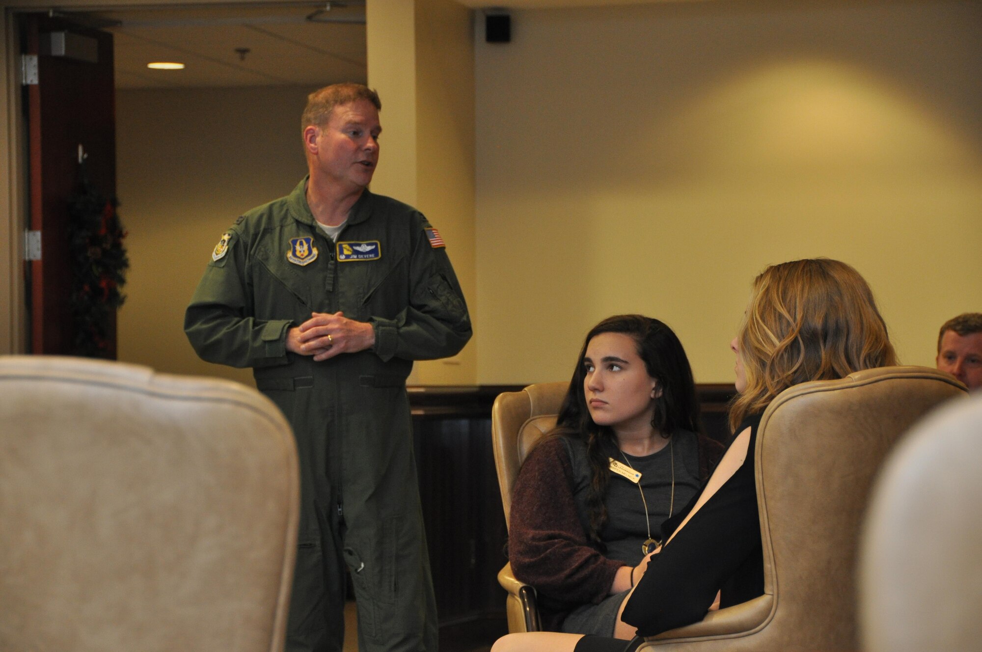 Cobb Youth Leadership students receive a mission brief from Col. Jim DeVere, 94th Operations Group commander. CYL students got a first-hand look at various Airman jobs and responsibilities. (U.S. Air Force photo by Senior Airman Lauren Douglas)