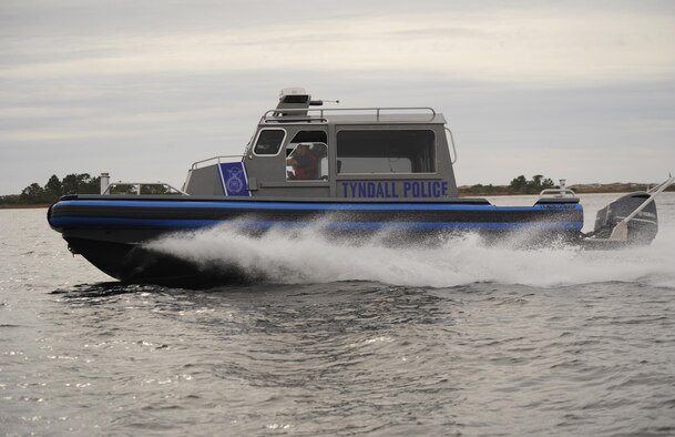 Defenders from the 325th Security Forces Squadron patrol the coastline around Tyndall Air Force Base, Fla., Jan. 26, 2016, in a valor class North River boat. The new boats will help the 325th SFS provide force protection to 128 miles of shoreline in support of 325th Fighter Wing and 30 associate units. (U.S. Air Force photo/Senior Airman Solomon Cook)