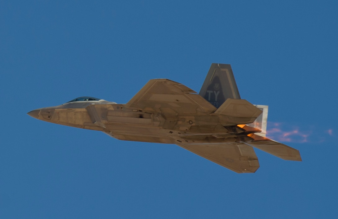 An F-22 Raptor from Tyndall Air Force Base, Fla., flies over Nellis AFB, Nev., during Red Flag 16-1, Feb. 5, 2016. Twelve Tyndall F-22s participated in Red Flag 16-1, a joint-training, full-spectrum readiness exercise designed to provide the most realistic combat training possible. (U.S. Air Force photo/Senior Airman Alex Fox Echols III)