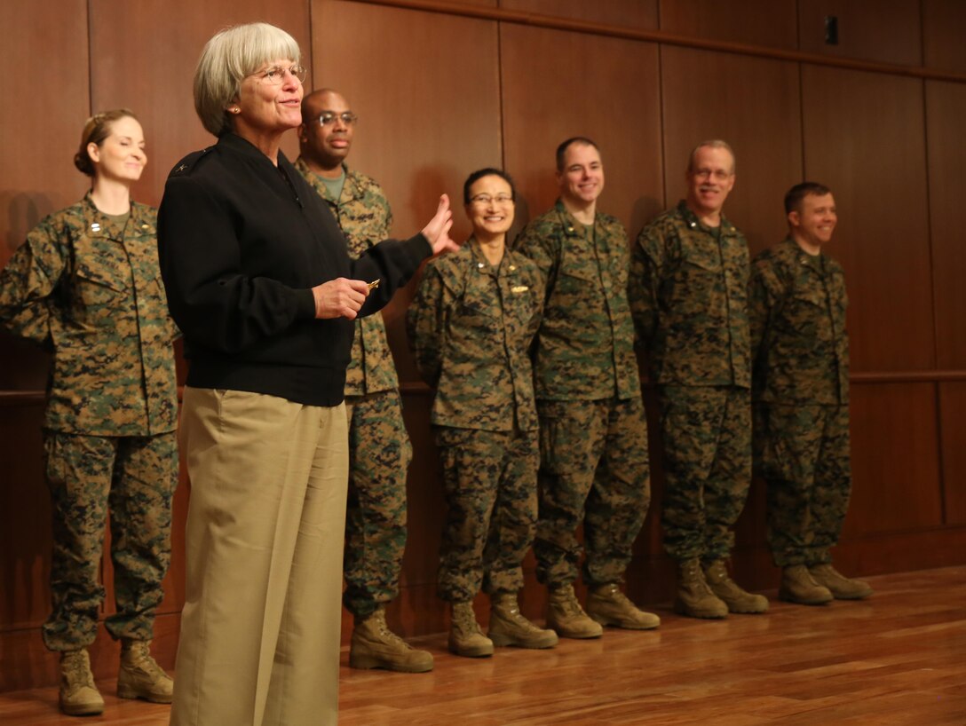 Rear Adm. Priscilla B. Coe, the deputy chief of the Navy Reserve Dental Corps, congratulates Navy medical personnel who earned their Fleet Marine Force pin, Feb. 19, 2016, during the annual Marine Forces Reserve Surgeon’s Training Conference at Marine Corps Support Facility New Orleans.  Only sailors attached to forward-deployable Marine units are eligible to earn the FMF pin.  (U.S. Marine Corps photo by Sgt. Brytani Musick)