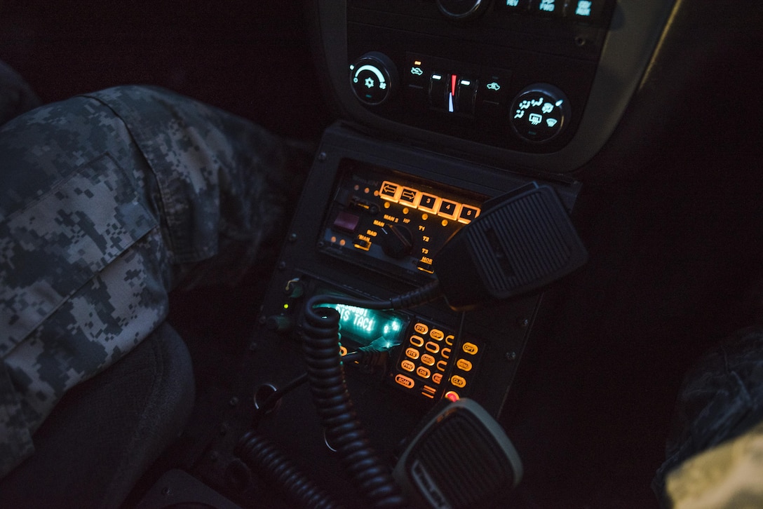 A call from the Fort Myer police dispatcher sounds over the radio during a morning patrol involving U.S. Army Reserve military police Soldiers from the 200th Military Police Command, working alongside active duty Soldiers from the 289th MP Co., belonging to the 3rd U.S. Infantry Regiment (The Old Guard), to provide law and order, security and patrol support at various active duty installations in the Military District of Washington, D.C., Feb. 17. This partnership pilot program began in early February, placing Army Reserve Soldiers on active duty orders for three weeks while working at Joint Base Myer-Henderson Hall, Fort Lesley J. McNair and the Arlington National Cemetery. Soldiers will also support the Military District of Washington with additional duty days throughout the year. (U.S. Army photo by Master Sgt. Michel Sauret)