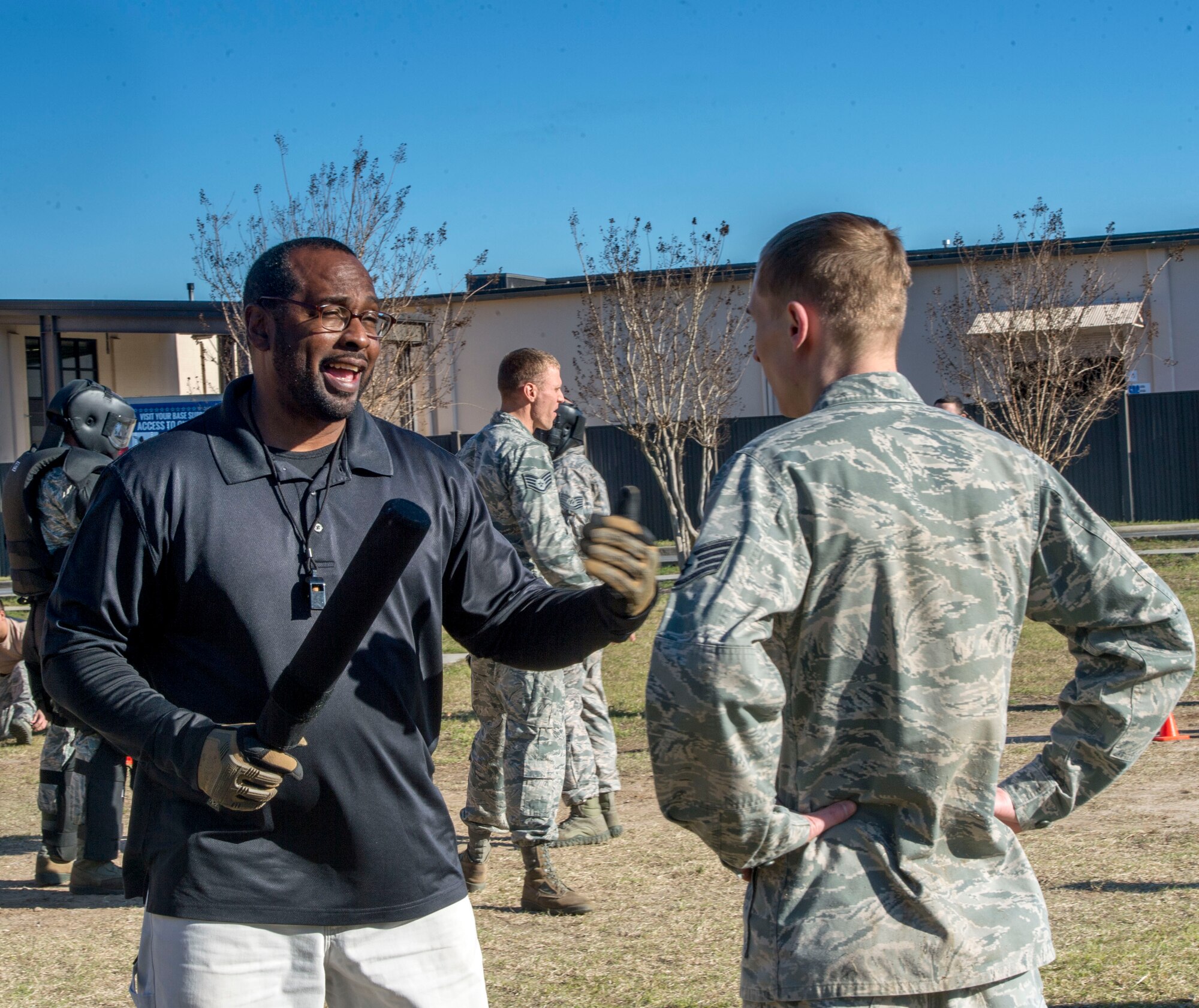 Keith Parker, Department of Air Force manager with the 1st Special Operations Security Forces Squadron, critiques an Airman during training at Hurlburt Field, Fla., Feb. 10, 2016. Security Forces personnel participate in combat scenario exercises to gain real-world experience. (U.S. Air Force photo by Senior Airman Krystal M. Garrett)