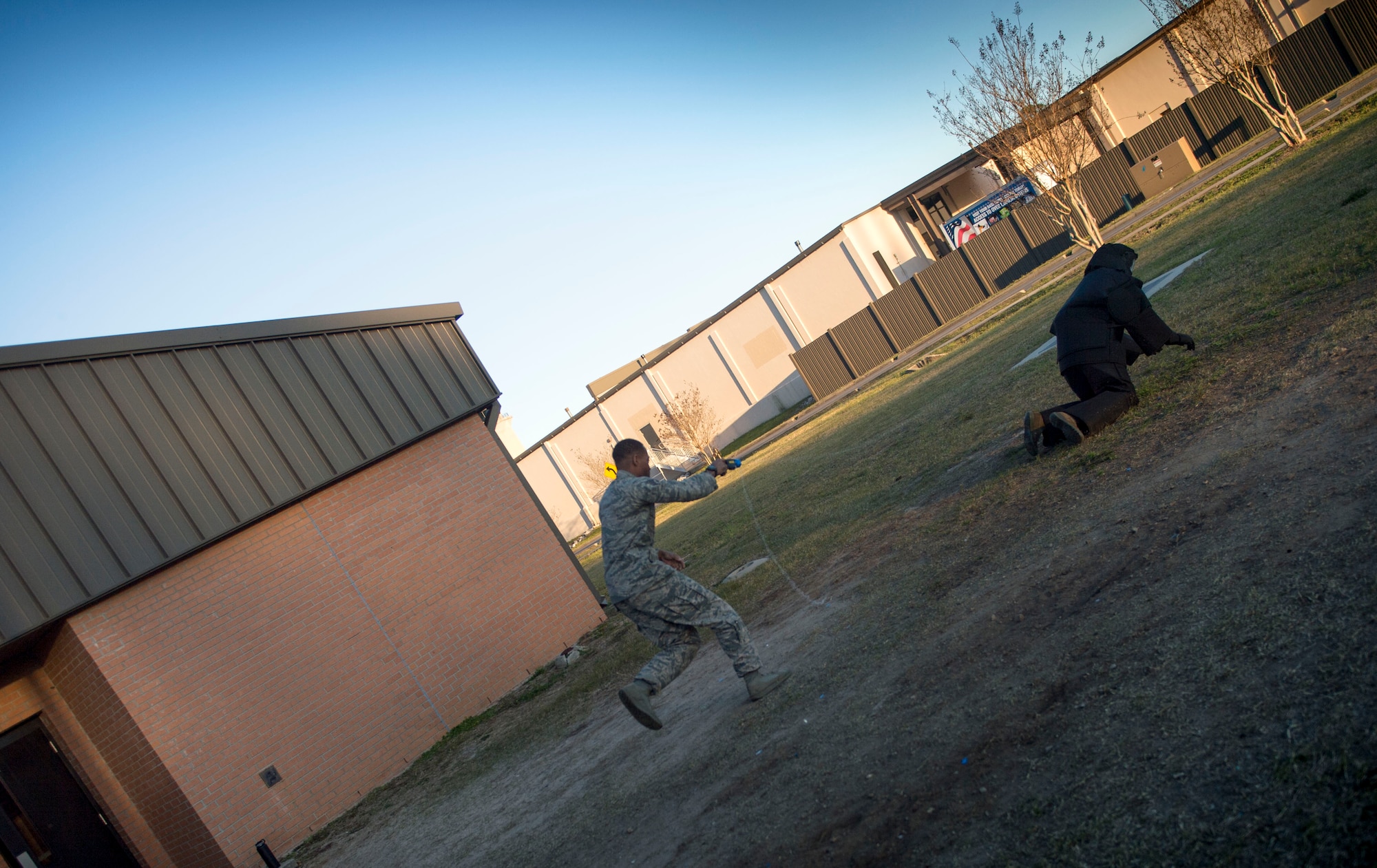 Staff Sgt. Kendrick Woodson, an installation patrolman with the 1st Special Operations Security Forces Squadron, incapacitates a suspect during taser training at the 1st SOSFS, Hurlburt Field, Fla., Feb. 10, 2016. Security Forces personnel are taught the correct way to tase and apprehend a suspect. (U.S. Air Force photo by Senior Airman Krystal M. Garrett)  