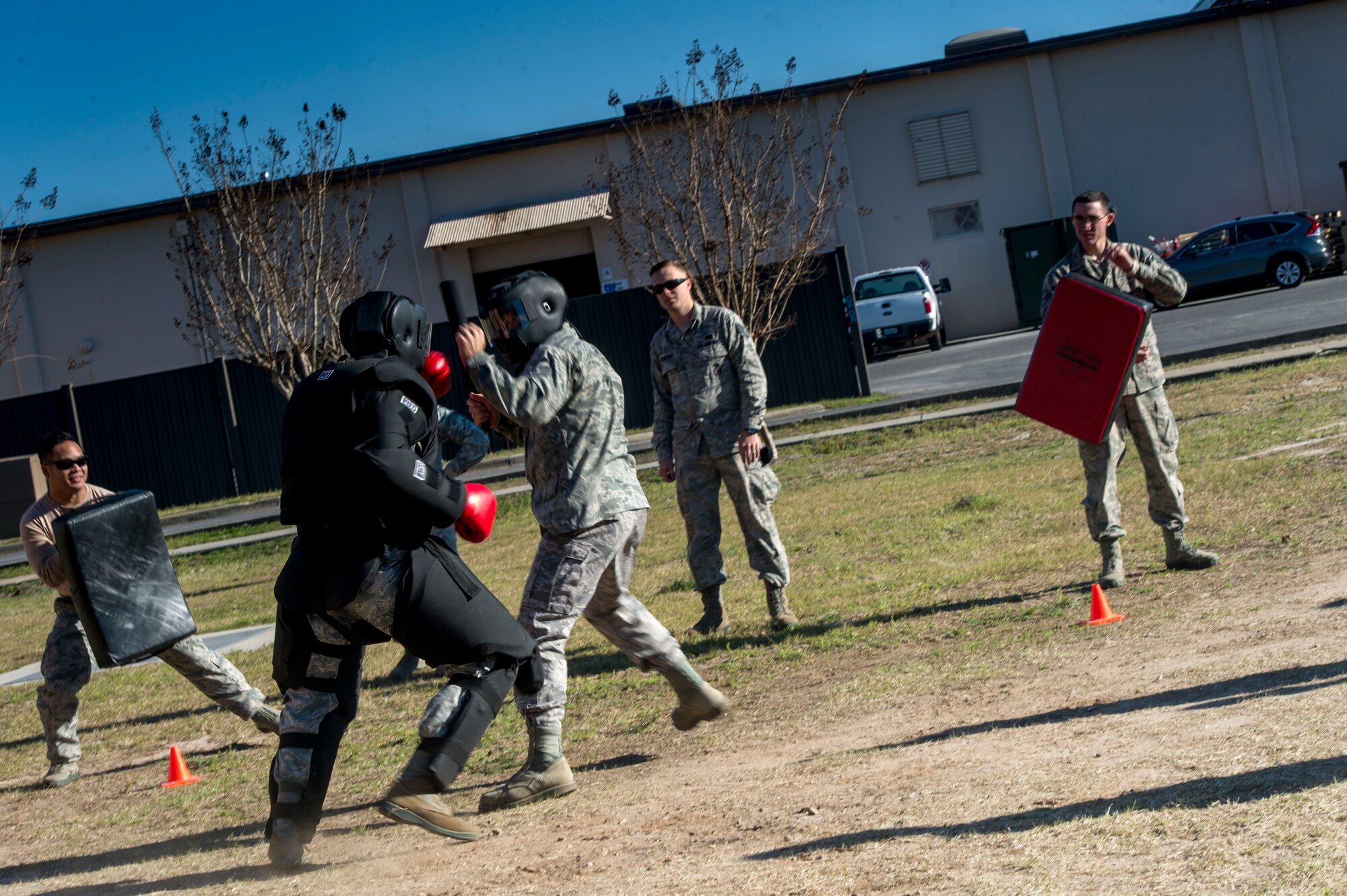 Airmen with the 1st Special Operations Security Forces Squadron practice their baton skills during baton training at Hurlburt Field, Fla., Feb. 10, 2016. Security Forces personnel participate in combat scenario exercises to gain real-world experience. (U.S. Air Force photo by Senior Airman Krystal M. Garrett)