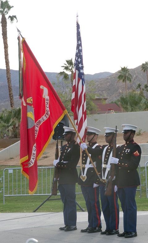 The Combat Center Color Guard presents the national colors while the national anthem is sung before the unveiling ceremony of a veterans’ memorial wall at the Rancho Mirage Community Park, Feb. 14, 2016. (Official Marine Corps photo by Cpl. Thomas Mudd/Released)