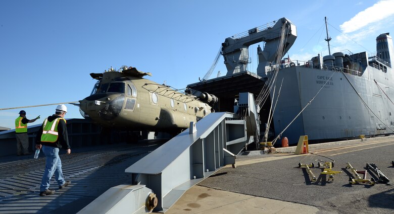 A Chinook helicopter is being offloaded from the Cape Race, a vehicle carrier stationed in Norfolk, Virginia, during a four-day, joint redeployment operation aboard Marine Corps Support Facility, Blount Island Command, Jacksonville, Fla., Jan. 13-17. Soldiers with the 101st Combat Aviation Brigade, Fort Campbell, Ky., nicknamed the “Wings of Destiny,” returned to BICmd from their nine-month deployment to Afghanistan.