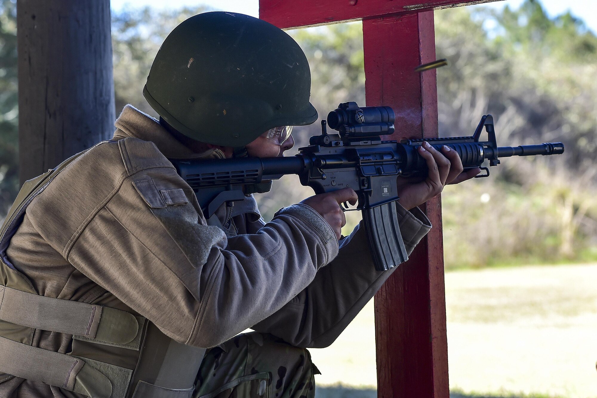 Tech. Sgt. Ruben Garcia, a tactical systems officer with the 25th Intelligence Squadron, fires an M4 rifle at the combat arms training and maintenance range, Hurlburt Field, Fla., Feb 16, 2016. Hurlburt’s CATM range is the second busiest in the Air Force where they annually qualify approximately 11,000 students on the M9 pistol and M4 rifle. (U.S. Air Force photo by Senior Airman Jeff Parkinson)
