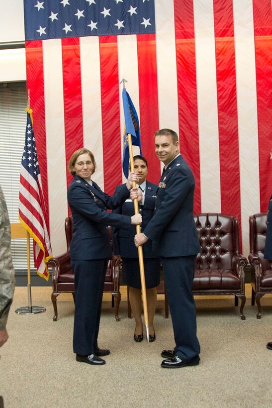 Lt. Col. Michael Drew assumes command of the 349th Operations Support Squadron from Lt. Col. Christopher Von Thaden during a ceremony Feb. 7, 2016 at Travis Air Force Base, Calif. Prior to assuming command, Drew served as the director of operations for the 349th OSS. (U.S. Air Force photo/Airman 1st Class Shelby R. Horn)