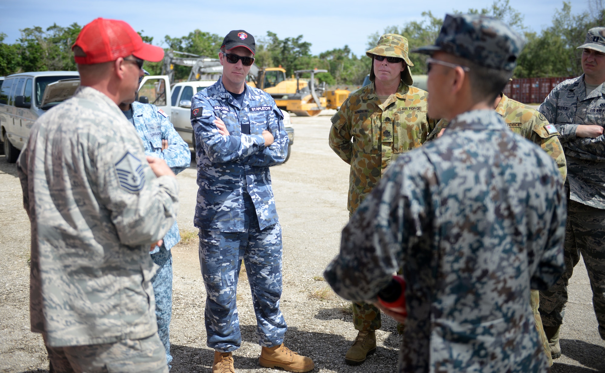 U.S. Air Force Master Sgt. Mike English, 554th RED HORSE Squadron Silver Flag instructor, explains chemical, biological, radiological and nuclear hazards to students during Partner Nation Silver Flag, Feb. 16, 2016, at Andersen Air Force Base, Guam. Silver Flag is a U.S. Pacific Command multilateral Theater Security Cooperation Program subject-matter expert exchange event designed to build partnerships and promote interoperability through the equitable exchange of civil engineer related information. This is the first multilateral Partner Nation Silver Flag. (U.S. Air Force photo by Senior Airman Joshua Smoot/Released)
