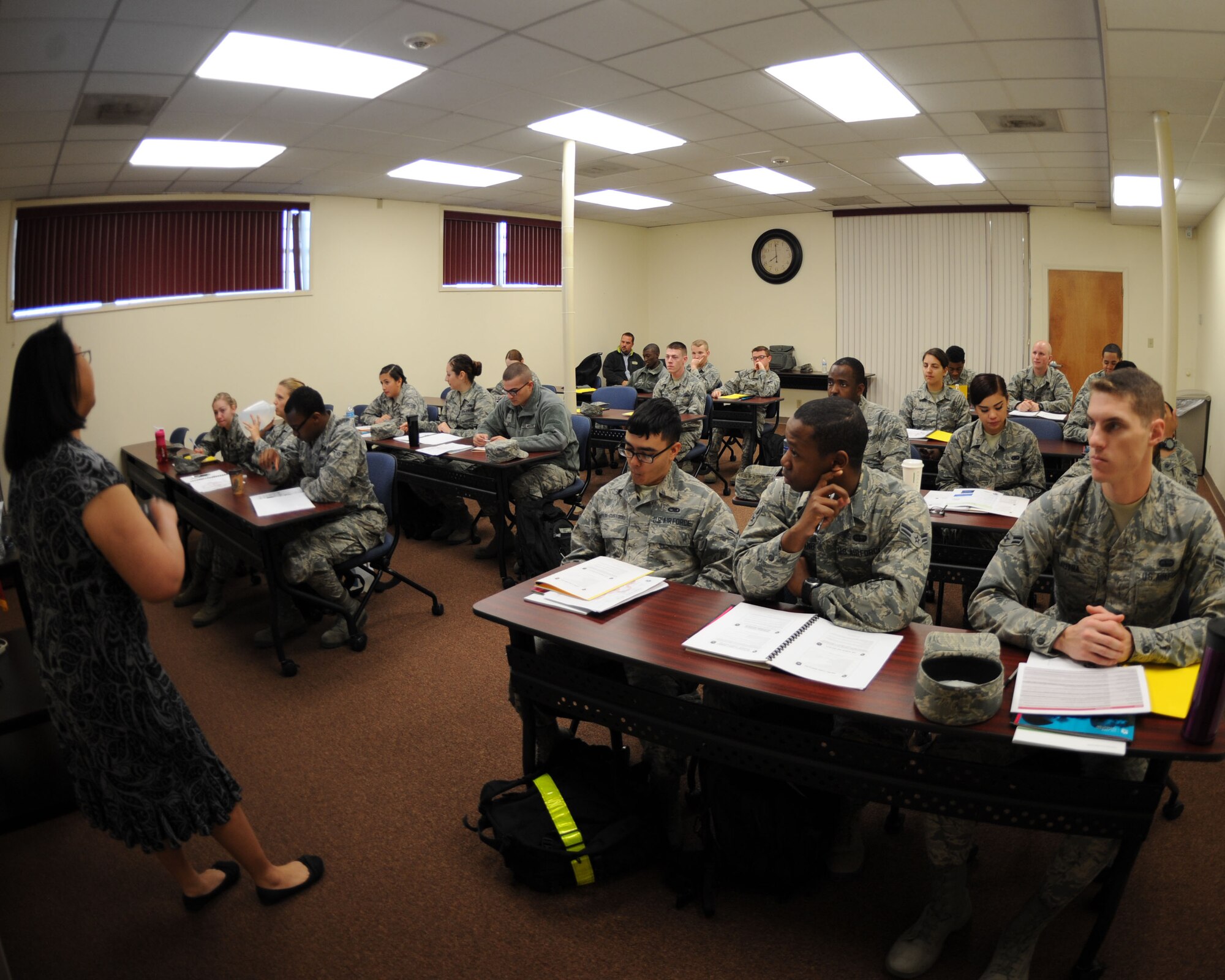 U.S. Air Force Airmen, newly assigned to Dyess, participate in a personal financial readiness class Feb. 11, 2016, at Dyess Air Force Base, Texas. The Airmen and Family Readiness Center offers a variety of courses to help those who need it. Requests can be made to have a class taught to an entire unit at a location of their choosing, or a one-on-one session is also available upon request.  (U.S. Air Force photo by Senior Airman Shannon Hall/Released)