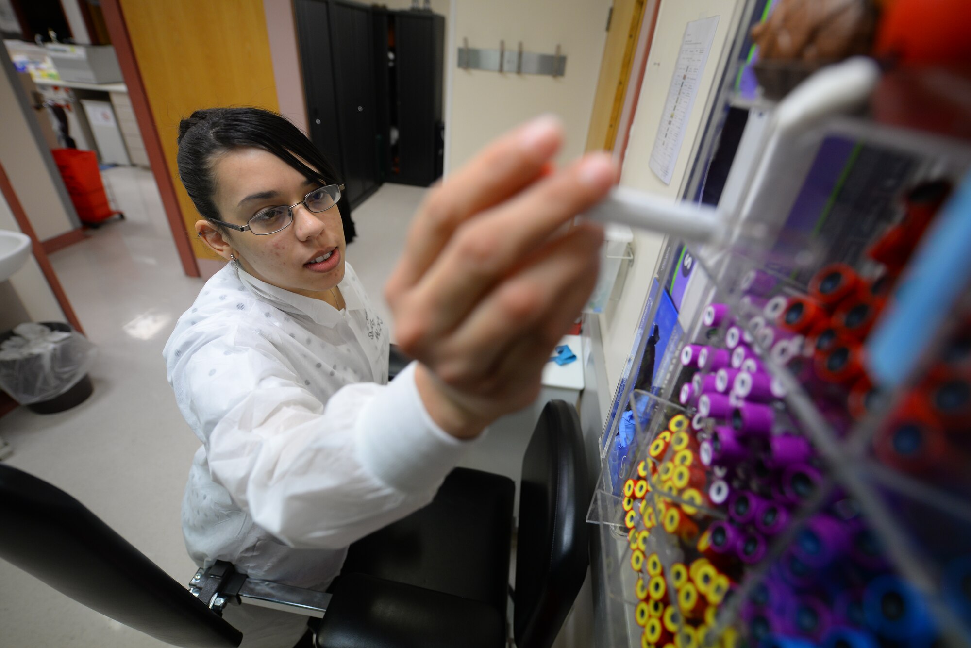 Sasha Southee-Mallin, 48th Medical Support Squadron laboratory technician, stocks medical supplies Feb. 11, 2016 on RAF Lakenheath, England. Southee-Mallin and her husband, U.S. Air Force Senior Airman Matthew Mallin, 100th Communication Squadron wing cyber security technician, provided lifesaving medical care until emergency responders arrived to a heart-attack victim Jan. 17, 2016, while on vacation in Norway. (U.S. Air Force photo by Staff Sgt. Micaiah Anthony/Released)