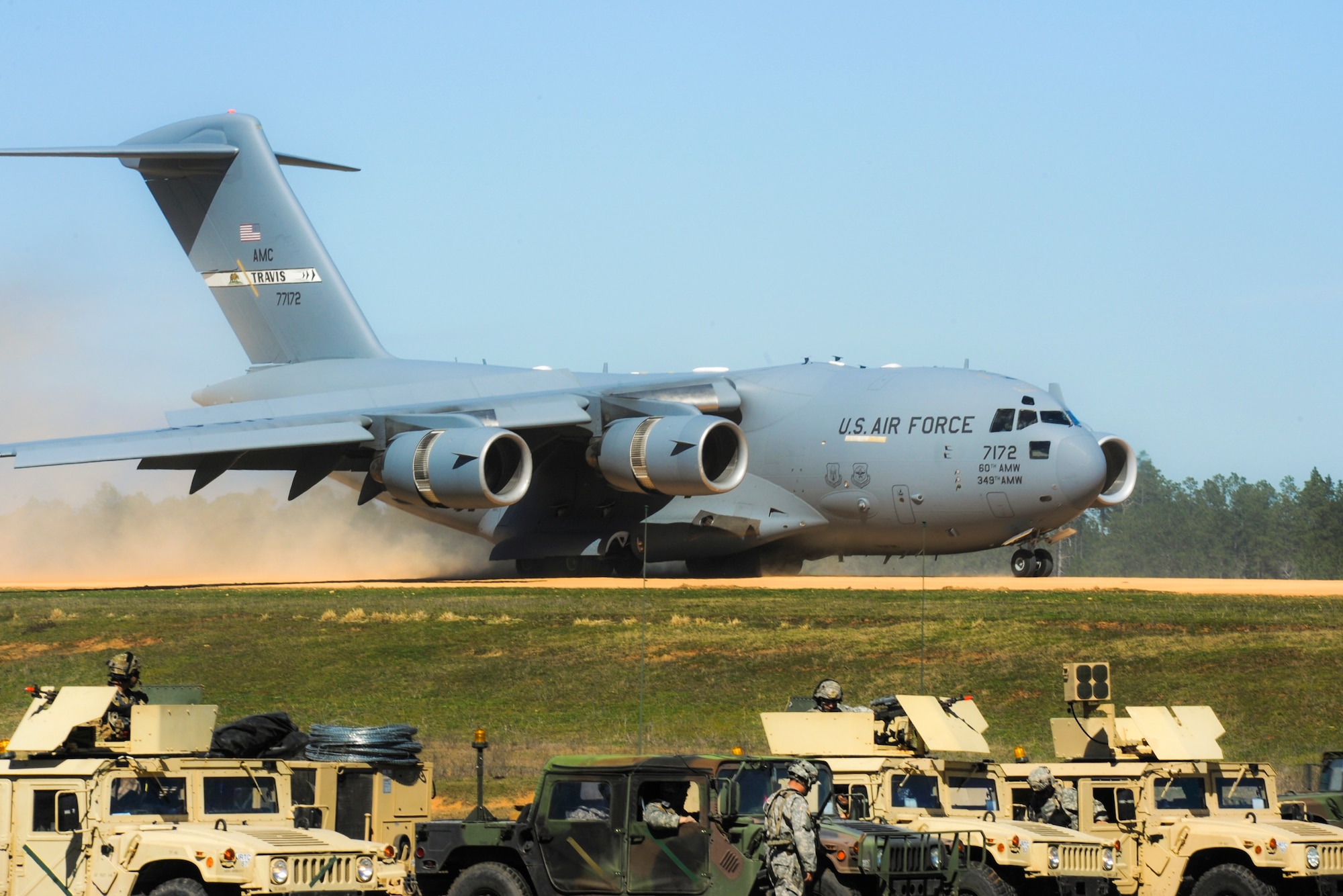 A U.S. Air Force C-17 Globemaster lands at the Geronimo Landing Zone during GREEN FLAG 16-04 on Fort Polk, La., Feb. 17, 2016. Green Flag exercises provide Airmen, Soldiers, Marines and NATO members with the most realistic, tactical-level, joint combat employment training tailored to mobility Air Force needs. (U.S. Air Force photo/Senior Airman Harry Brexel)