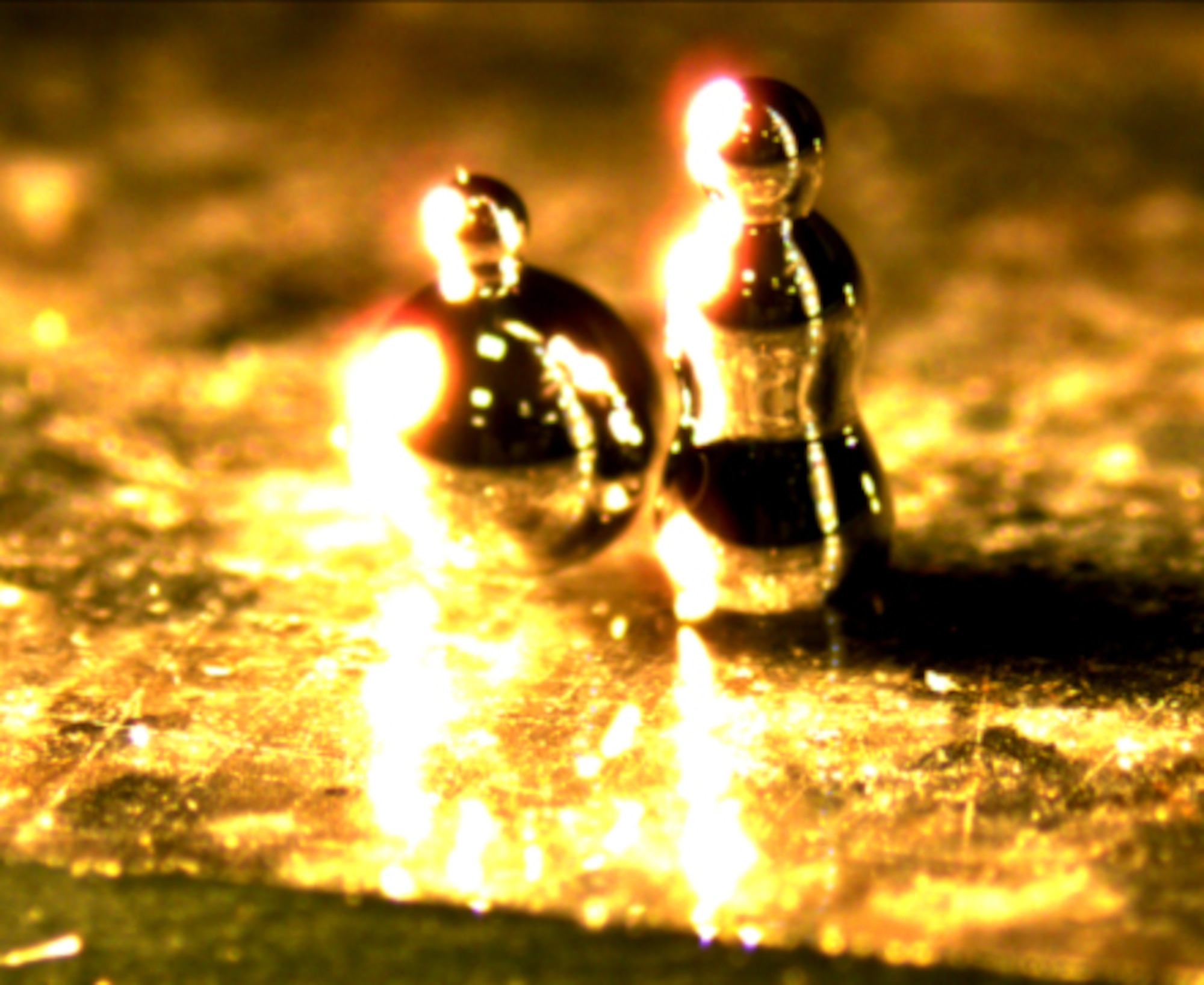 The enabling attributes of Gallium Liquid Metal Alloys (GaLMAs) make them ideal for 3D freestanding liquid metal structures, as demonstrated by these GaLMA “snowmen.” These structures can lead to the development of three-dimensional circuitry. (U.S. Air Force photo)