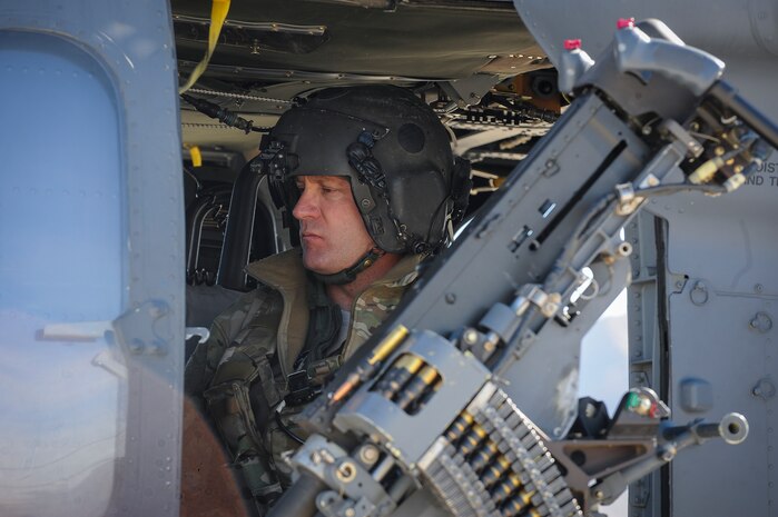 Senior Master Sgt. Thomas Dietrich, 210th Rescue Squadron special mission aviator from Joint Base Elmendorf-Richardson, Alaska, conducts pre-flight checks in preparation for take-off during Red Flag 16-1 Feb. 11, 2016 at Nellis Air Force Base, Nev. Special mission aviators are responsible for conducting pre-flight inspections for engine and aircraft systems as well as operating airborne weapon systems. (U.S. Air Force photo by Senior Airman Jake Carter)