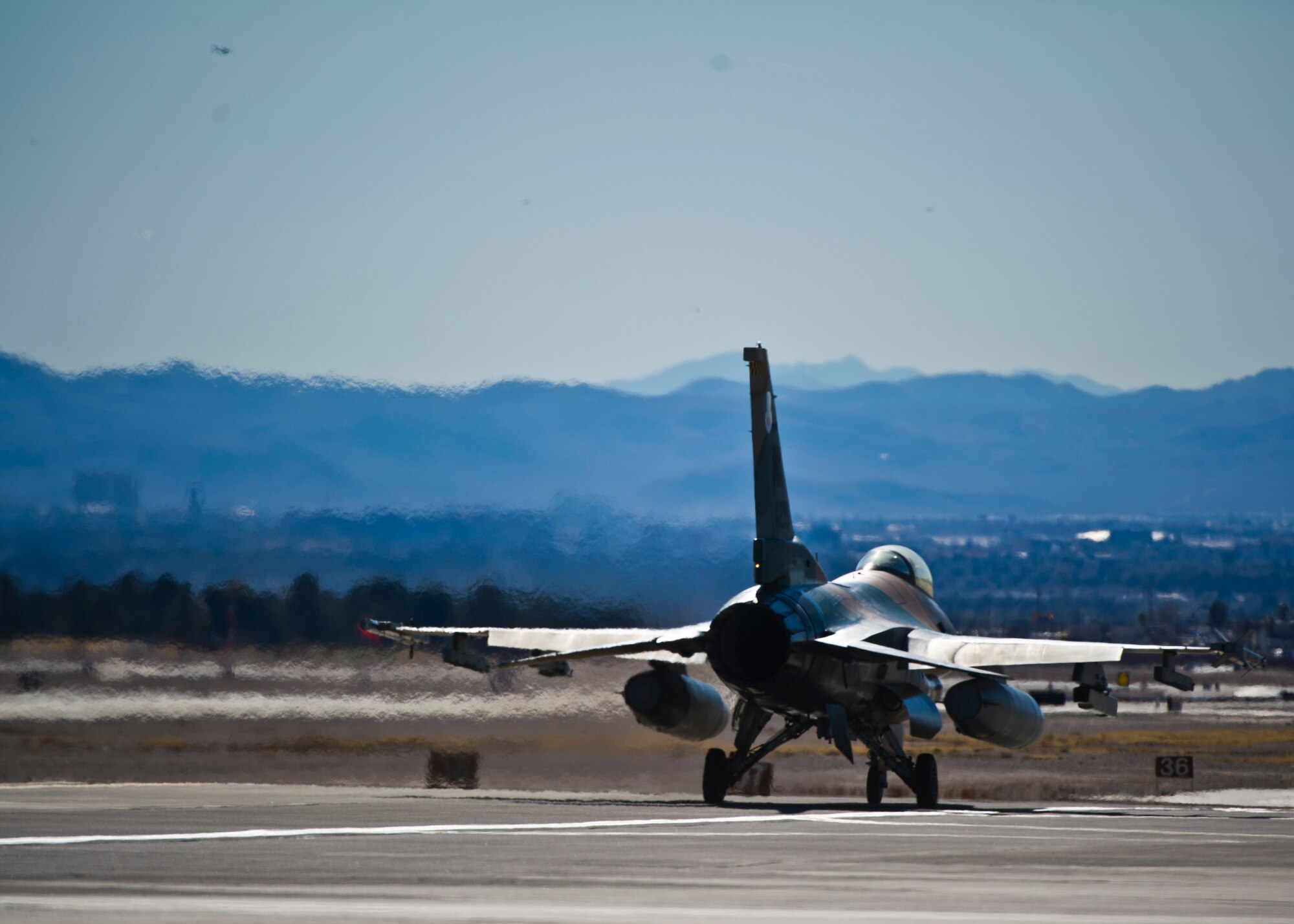 Lt. Col. Jan Stahl, 926th Operations Group F-16 Fighting Falcon pilot, departs for a Red Flag 16-1 training mission Feb. 5, 2016, at Nellis Air Force Base, Nev. Red Flag's purpose is to maximize the combat readiness, capability and survivability of its participants by providing realistic training in a combined air, ground, space and electronic threat environment. (U.S. Air Force photo/Senior Airman Brett Clashman)