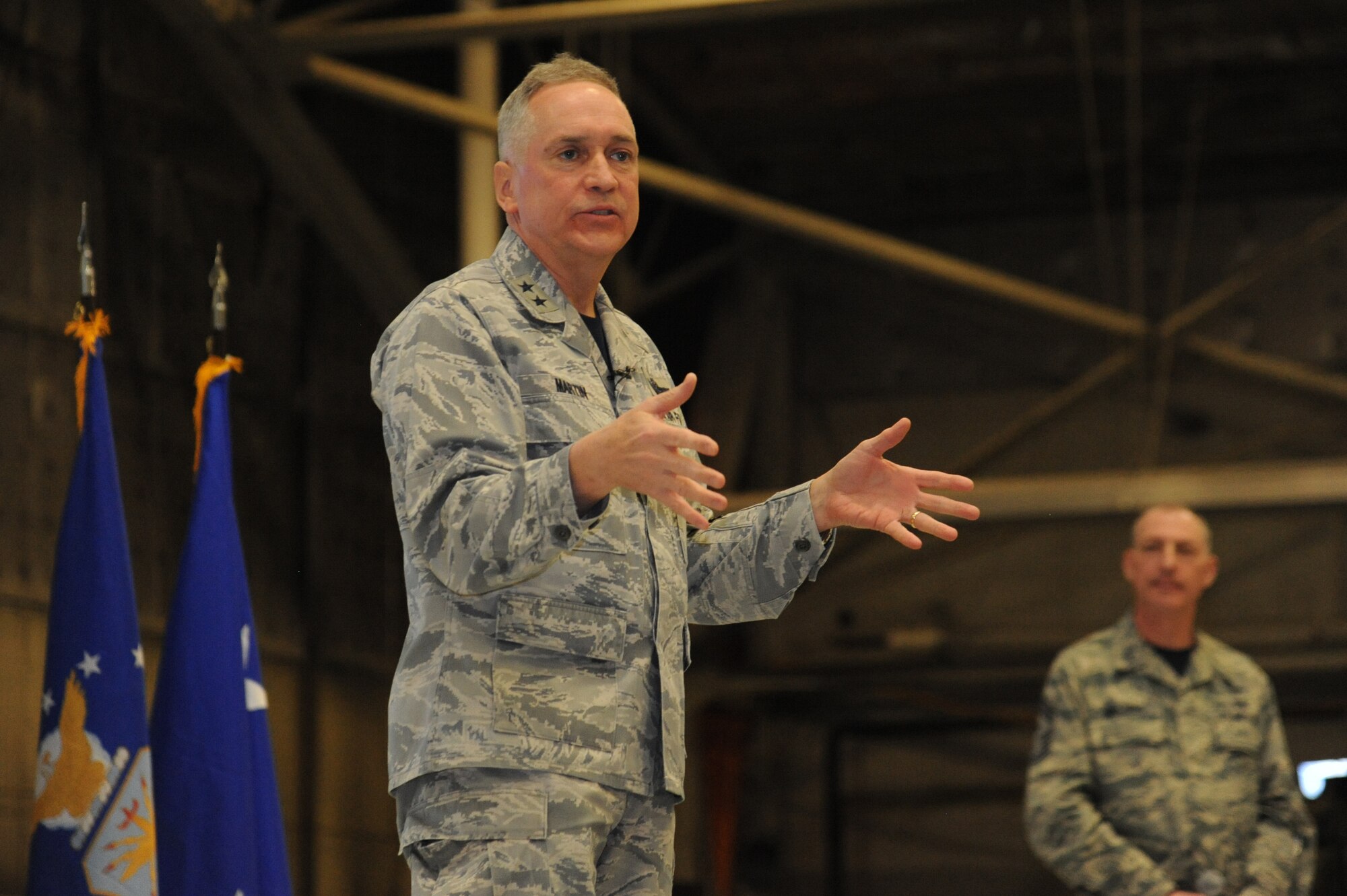 Maj. Gen. Frederick H. Rick Martin, U.S. Air Force Expeditionary Center commander, and AFEC Command Chief Master Sgt. Larry C. Williams Jr. speak to the Warriors of the North Feb. 19, 2016, on Grand Forks Air Force Base, N.D. The AFEC provides operational control of the Expeditionary Operations School and administrative control for six wings and two groups within the Air Mobility Command, including the 319th Air Base Wing located on Grand Forks AFB. (U.S. Air Force Photo by Tech. Sgt. David Dobrydney/Released)