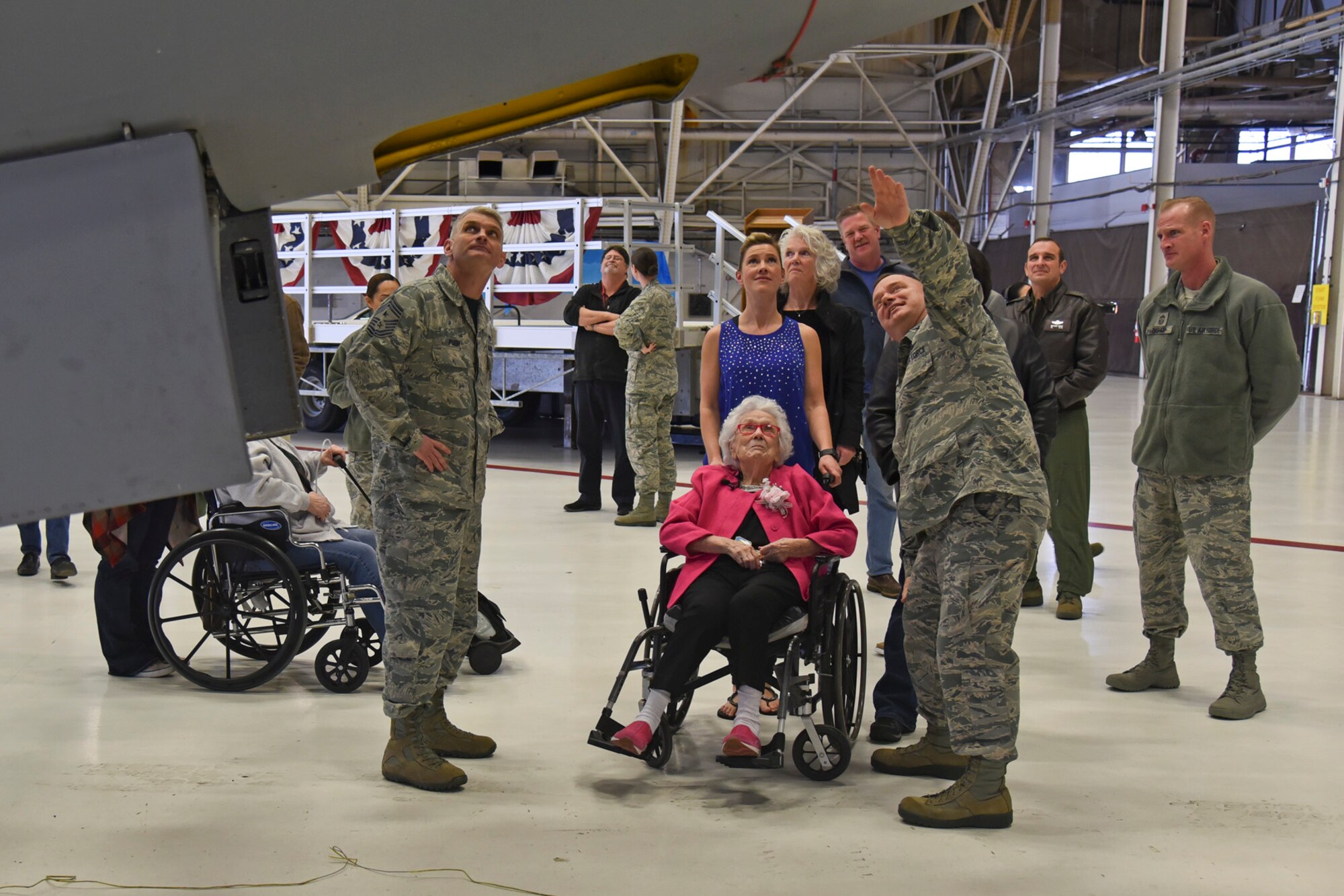 Col. Brian McDaniel, 92nd Air Refueling Wing commander, explains the ins and outs of the KC-135 Stratotanker with Ms. Flossie Dickey Feb. 19, 2016, at Fairchild Air Force Base, Wash. Fairchild leadership helped celebrate Flossie’s 110th birthday by recognizing her as a Fairchild Honorary Airman. During Flossie’s visit, she toured the aircraft, met base leadership and was presented with a certificate recognizing her as Fairchild Honorary Airman. (U.S. Air Force photo/Airman 1st Class Mackenzie Richardson)