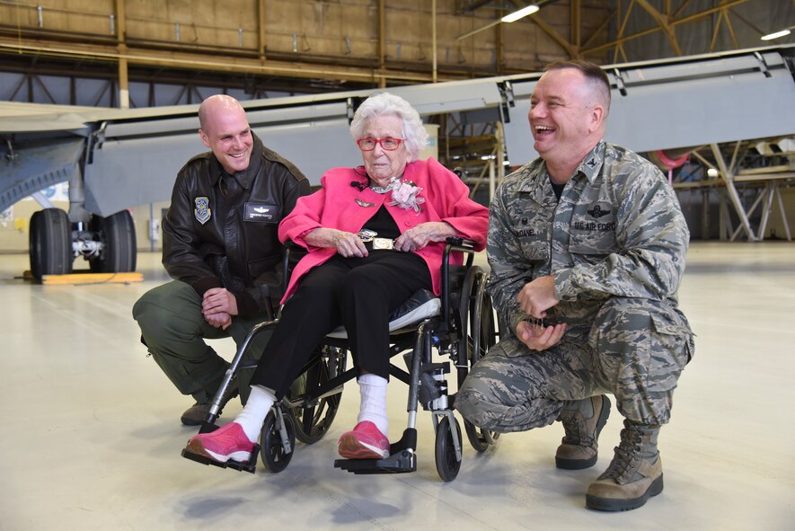 Col. Brian McDaniel, 92nd Air Refueling Wing commander, and Tech. Sgt. Christopher Pedersen, 92nd ARW command chief executive, talk about the boom pod and boom operator career with Ms. Flossie Dickey Feb. 19, 2016, at Fairchild Air Force Base, Wash. Fairchild leadership helped celebrate Flossie’s 110th birthday by recognizing her as a Fairchild Honorary Airman. (U.S. Air Force photo/Airman 1st Class Mackenzie Richardson)
