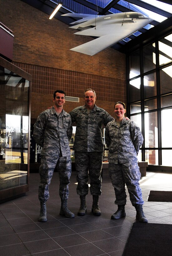 Air Force Chief of Staff Gen. Mark A. Welsh III, center, Senior Airman Joel Pfiester, a 509th Bomb Wing Public Affairs photojournalist, left, and Senior Airman Emili Koonce, a 509th BW Public Affairs broadcast journalist, stand for a photo at the 509th BW headquarters building at Whiteman Air Force Base, Mo., Feb. 17, 2016. Welsh had the opportunity to meet with Airmen from various units on base and held an all call where he discussed Air Force issues and showed his support for the unique Total Force Integration mission at Whiteman. (U.S. Air Force photo by Senior Airman Joel Pfiester)