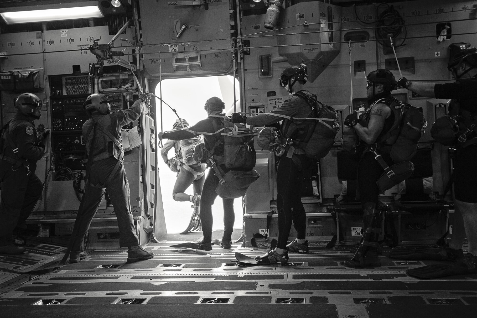 Guardian Angels from the 304th and 308th Rescue Squadrons jumped from C-17 Globemaster III aircraft from the 249th Airlift Squadron, Alaska Air National Guard, over the Atlantic Ocean near Patrick Air Force Base, Fla., Jan. 14 during a simulated astronaut rescue mission. The 249th AS worked with NASA, the 920th Rescue Wing, the 45th Space Wing and Detachment 3 of the 45th Operations Group to develop tactics, training and procedures to quickly and safely recover astronauts in the event they would need to abort their spacecraft. (Courtesy photo by Senior Airman Zac Heinen)