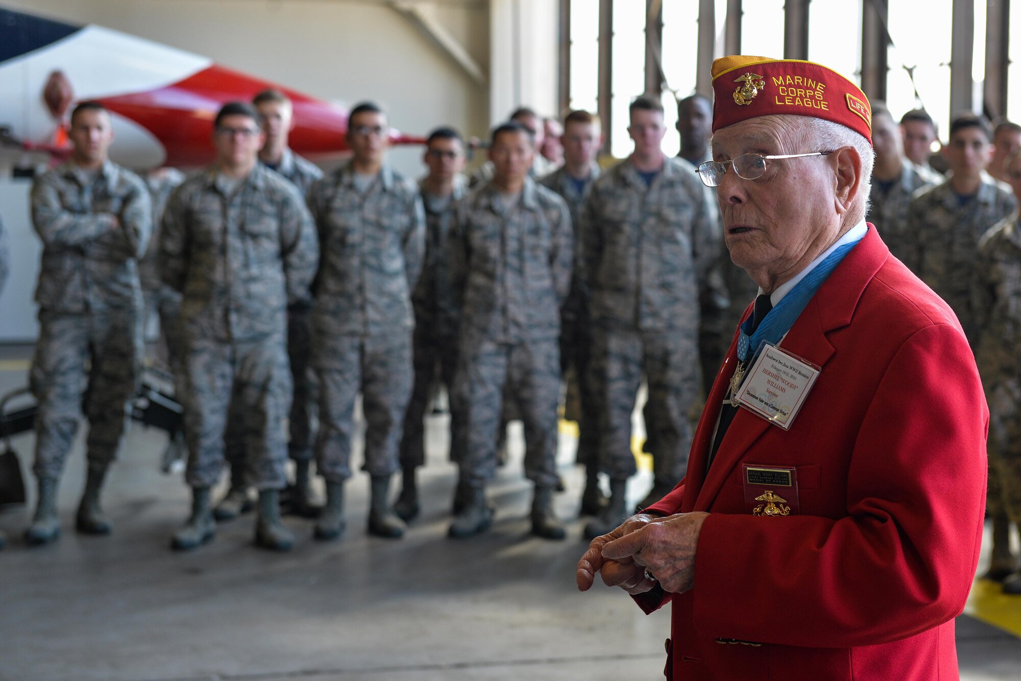 Hershel “Woody” Williams, Medal of Honor recipient, speaks to Airman at Sheppard Air Force Base, Texas, Feb. 19, 2016. Williams took a detour from the Iwo Jima reunion to visit with Airmen and speak about their oath and every day assumptions made about today’s service members. Williams was a Marine Corps corporal Feb. 21, 1945, when he used a flame thrower to clear Japanese fighting positions while U.S. forces were taking the island of Iwo Jima off the coast of Japan. (U.S. Air Force photo/Senior Airman Kyle Gese)