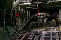 U.S. Air Force Reserve Master Sgt. Joshua Hames, a loadmaster assigned to the 327th Airlift Squadron, conducts a preflight inspection in a C-130 fuselage trainer at the U.S. Air Force C-130 Aircrew Training System schoolhouse at Little Rock Air Force Base, Ark., Feb. 16, 2016. Hames is in upgrade training as part of the 913th Airlift Group’s transition from the “H” model to the “J” model. (U.S. Air Force photo by Master Sgt. Jeff Walston/Released)