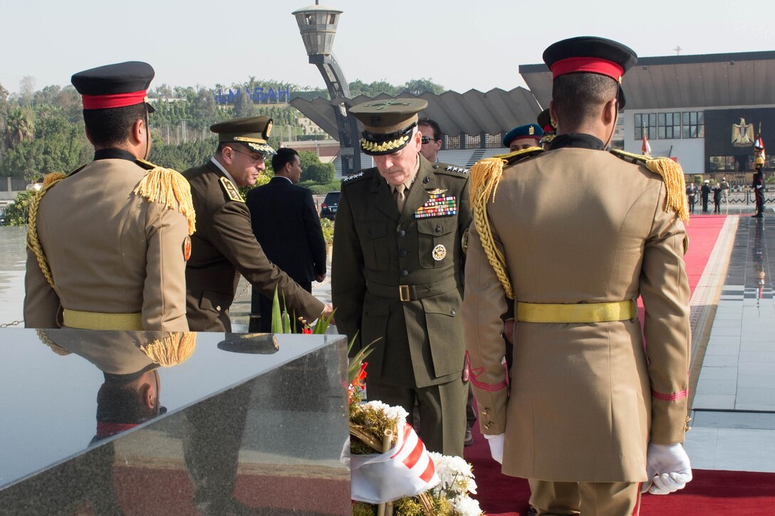 Marine Corps Gen. Joseph F. Dunford Jr., chairman of the Joint Chiefs of Staff, pauses after laying a wreath at the Unknown Soldier Memorial in Cairo, Feb. 20, 2016. Dunford also met with Egyptian military leaders to discuss strengthening the security partnership between both countries. DoD photo by D. Myles Cullen