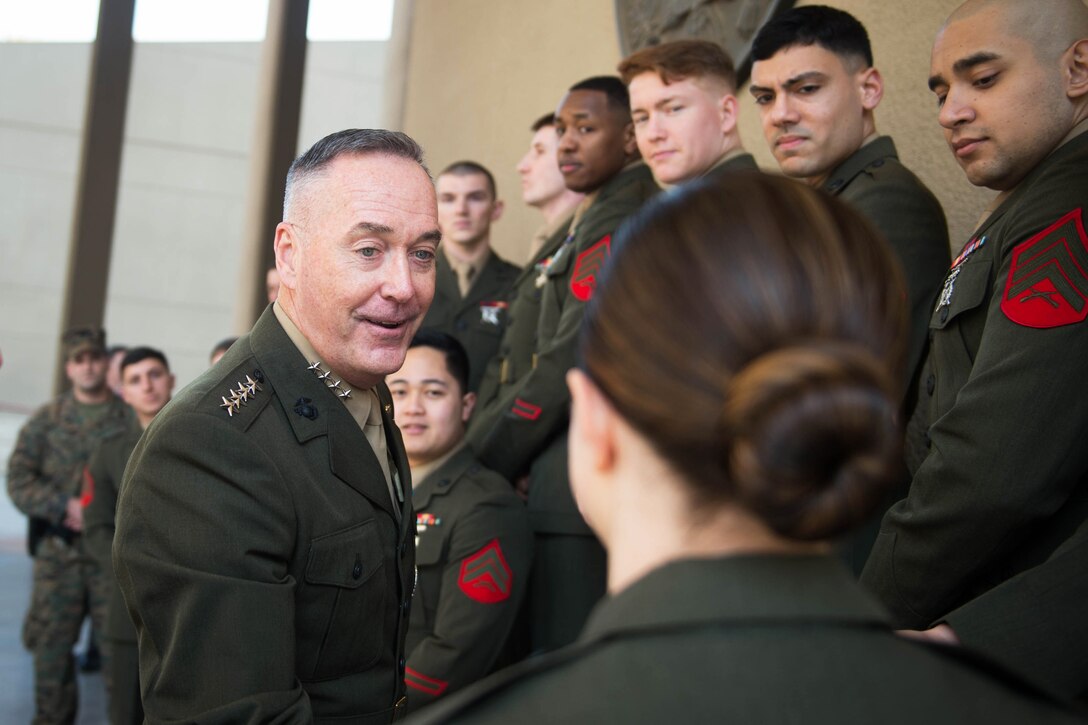 Marine Corps Gen. Joseph F. Dunford Jr., chairman of the Joint Chiefs of Staff, talks with members of the Marine Guard Detachment at the U.S. embassy in Cairo, Feb. 20, 2016. Dunford also met with Egyptian military leaders and visited the Unknown Soldier Memorial. DoD photo by D. Myles Cullen
