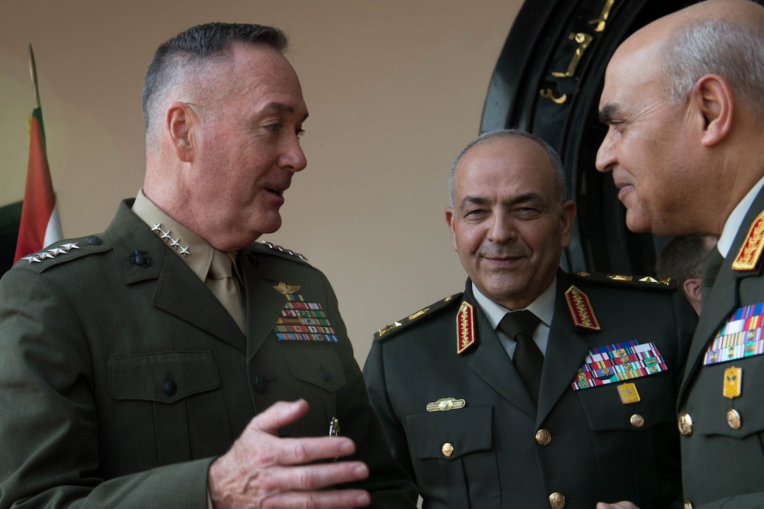 Marine Corps Gen. Joseph F. Dunford Jr., chairman of the Joint Chiefs of Staff, talks with Egyptian Defense Minister Col. Gen. Sedki Sobhy, right, and Egyptian Chief of the Armed Forces Lt. Gen. Mahmoud Hegazy, center, at the Ministry of Defense in Cairo, Feb. 20, 2016. DoD photo by D. Myles Cullen