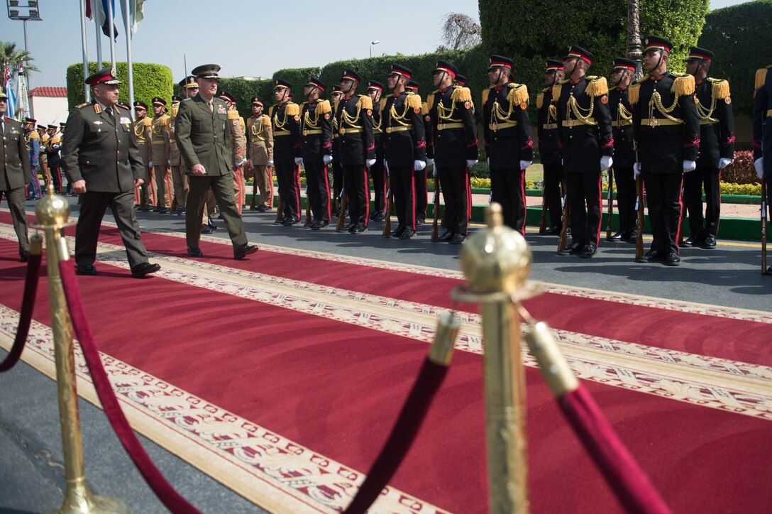 Marine Corps Gen. Joseph F. Dunford Jr., chairman of the Joint Chiefs of Staff, participates in a pass and review ceremony with the Egyptian Honor Guard at the Egyptian Ministry of Defense in Cairo, Feb. 20, 2016. DoD photo by D. Myles Cullen