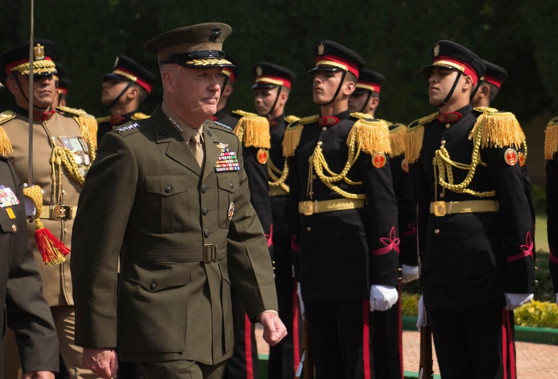 Marine Corps Gen. Joseph F. Dunford Jr., chairman of the Joint Chiefs of Staff, participates in a pass and review ceremony with the Egyptian Honor Guard at the Egyptian Ministry of Defense in Cairo, Feb. 20, 2016. DoD photo by D. Myles Cullen