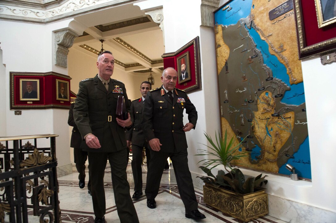 Marine Corps Gen. Joseph F. Dunford Jr., chairman of the Joint Chiefs of Staff, walks with Egyptian Chief of the Armed Forces Lt. Gen. Mahmoud Hegazy at the Ministry of Defense in Cairo, Feb. 20, 2016. DoD photo by D. Myles Cullen