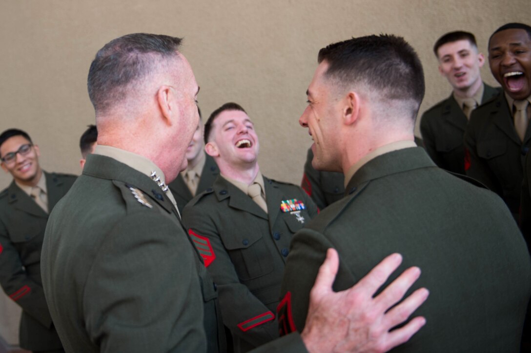 Marine Corps Gen. Joseph F. Dunford Jr., chairman of the Joint Chiefs of Staff, shares a laugh with members of the Marine Guard Detachment at the U.S. embassy in Cairo, Feb. 20, 2016. DoD photo by D. Myles Cullen