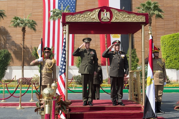 Marine Corps Gen. Joseph F. Dunford Jr., chairman of the Joint Chiefs of Staff, and Egyptian Chief of the Armed Forces Lt. Gen. Mahmoud Hegazy, right, render honors during an honor cordon at the Egyptian Ministry of Defense in Cairo, Feb. 20, 2016. DoD photo by D. Myles Cullen