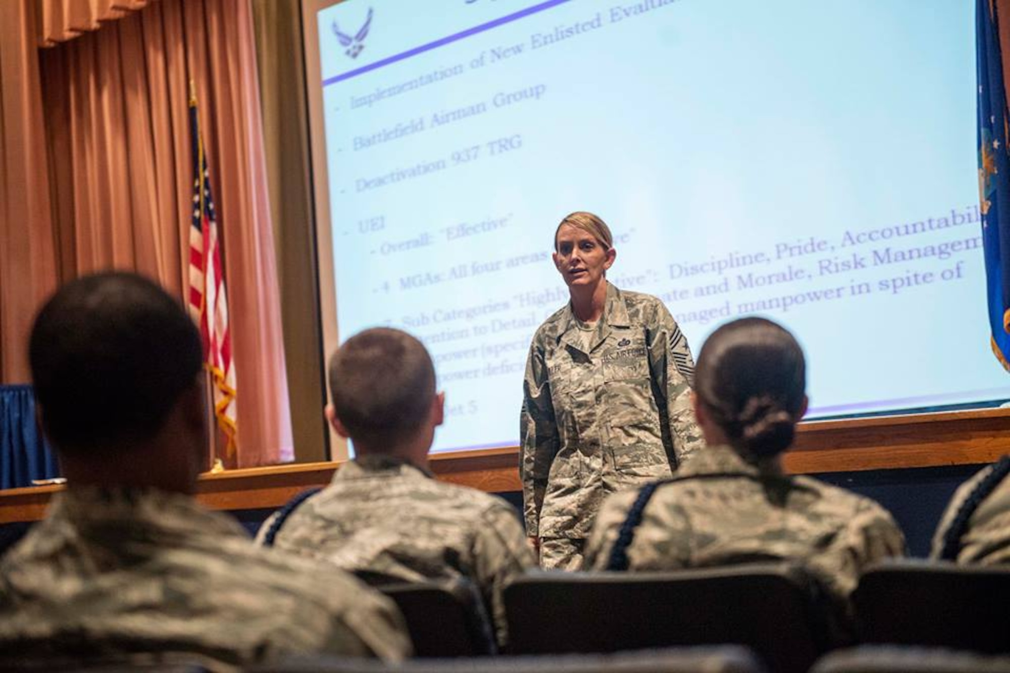 Chief Master Sgt. Sharon Fuller, 37th Training Wing command chief, answers a question during an enlisted call for 37th TRW Airmen Feb. 12. During the event, the command chief formally introduced herself to the wing and discussed some of her future plans to enable 37th TRW Airmen to maintain their standard of excellence. She also took questions from the audience which ranged in topics from the developmental special duty selection process to the upkeep of technical training dorms. 