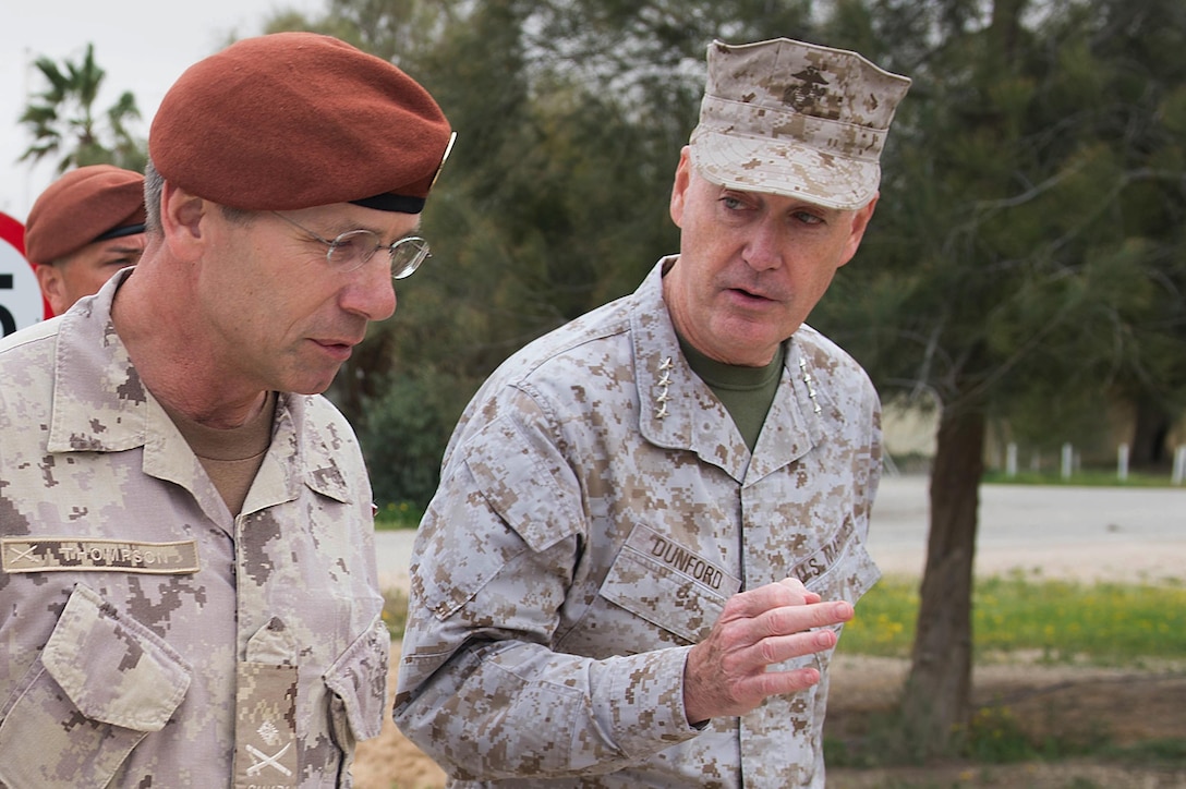 Marine Corps Gen. Joseph F. Dunford Jr., chairman of the Joint Chiefs of Staff, talks with Canadian Maj. Gen. Denis Thompson, commander of Multinational Force and Observers, on the North Camp in the Sinai Peninsula of Egypt, Feb. 21, 2016. DoD photo by D. Myles Cullen