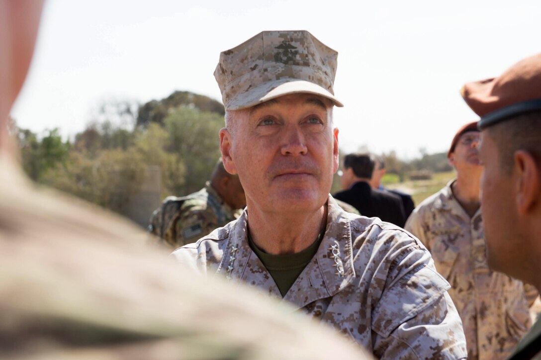 Marine Corps Gen. Joseph F. Dunford Jr., chairman of the Joint Chiefs of Staff, listens to soldiers assigned to the Multinational Force and Observers at the North Camp in the Sinai Peninsula of Egypt, Feb. 21, 2016. DoD photo by D. Myles Cullen 