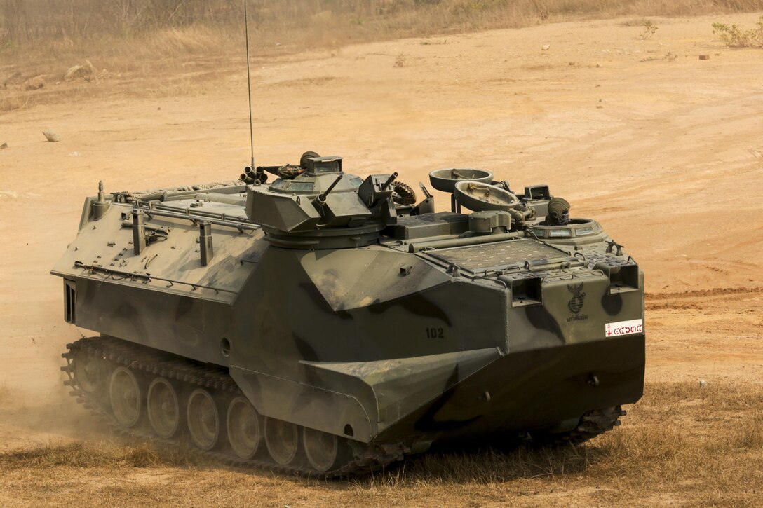 A Royal Thai amphibious assault vehicle moves towards the objective during a combined arms live fire exercise at Ban Chan Khrem, Thailand, during exercise Cobra Gold, Feb. 18, 2016. Cobra Gold  is a multinational training exercise developed to strengthen security and interoperability between the Kingdom of Thailand, the U.S. and other participating nations. (U.S. Marine Corps Combat Camera photo by Lance Cpl. Eryn L. Edelman/Released)